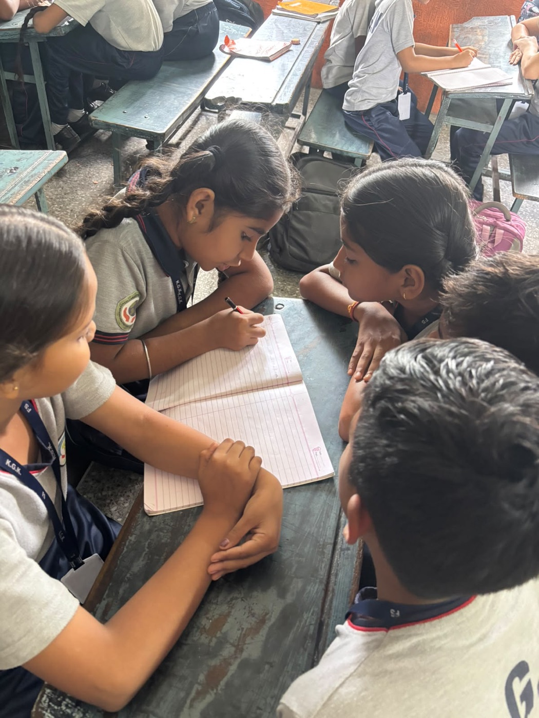 Students collaborating on classwork together